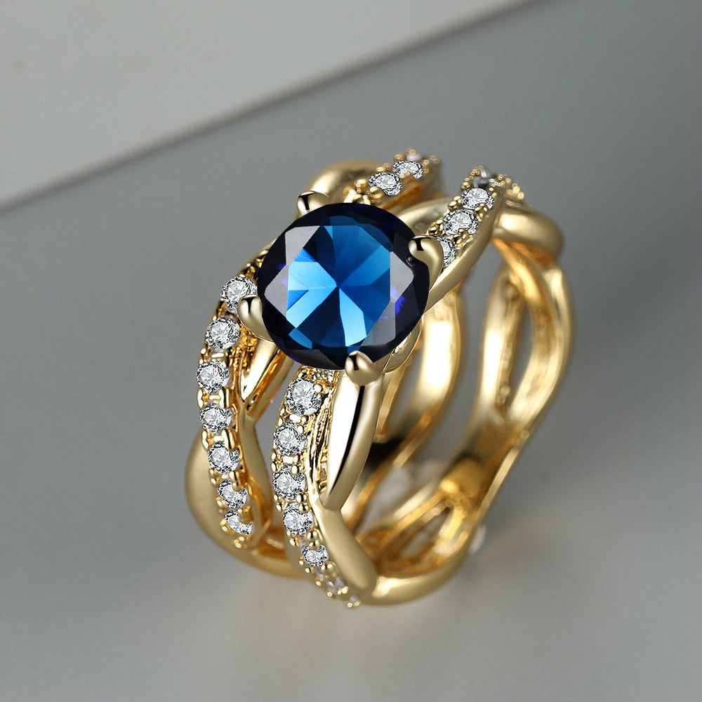 Bague Croix en Or Rose avec Zirconia Bleue Océan 18k