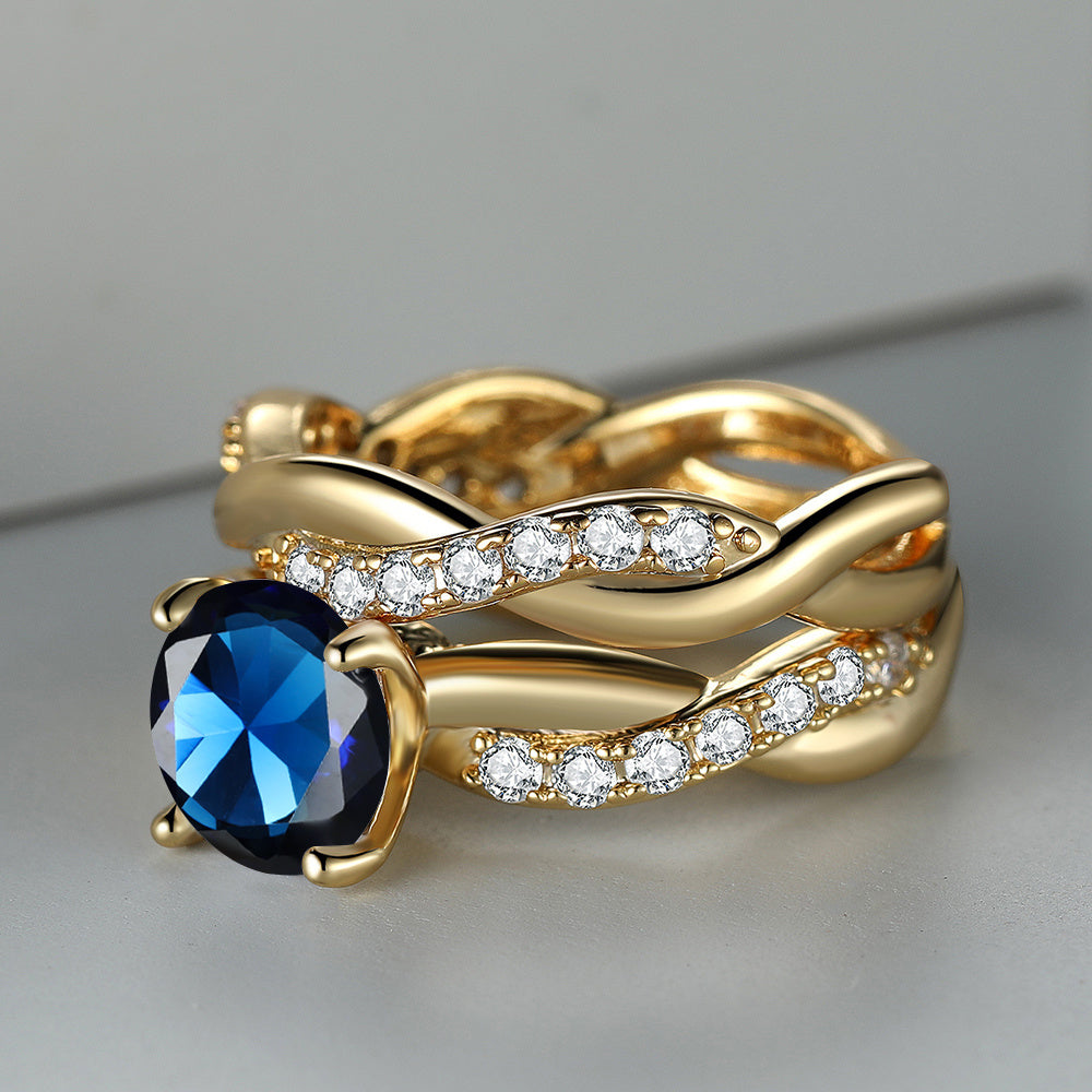 Bague Croix en Or Rose avec Zirconia Bleue Océan 18k