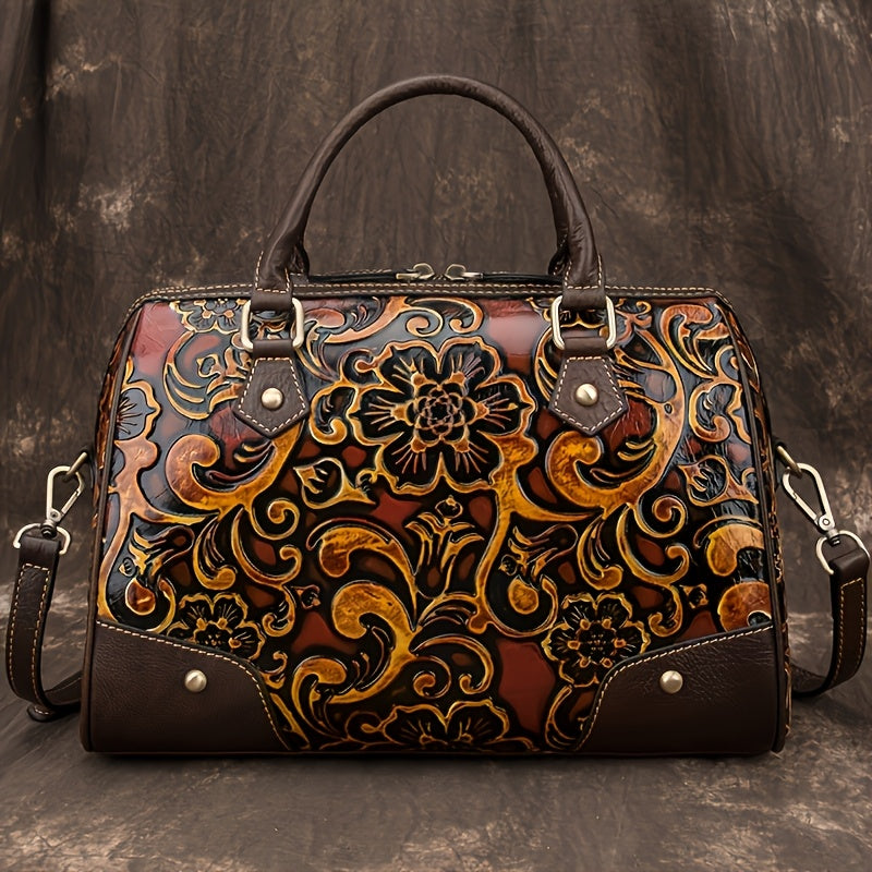 Elegant and versatile vintage floral pattern top grain leather handbag.