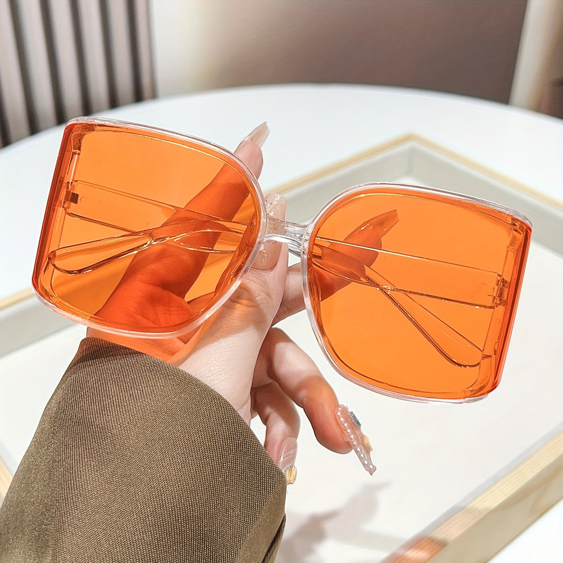 Trendy oversized sunglasses with curved lenses